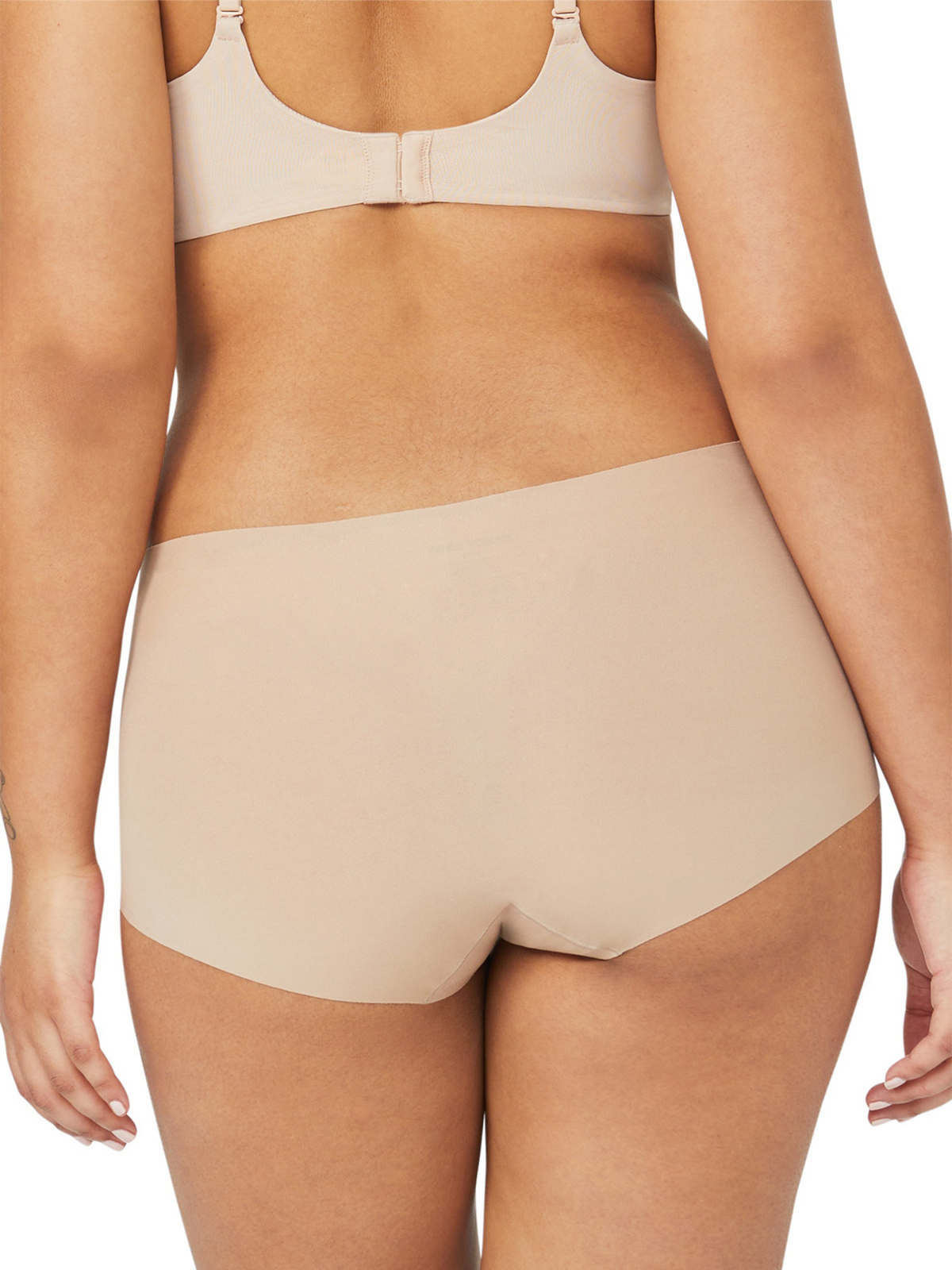 Back profile of Nancy Ganz Body Smart waisted brief shapewear featuring seamless edges and flattering smooth lines.
