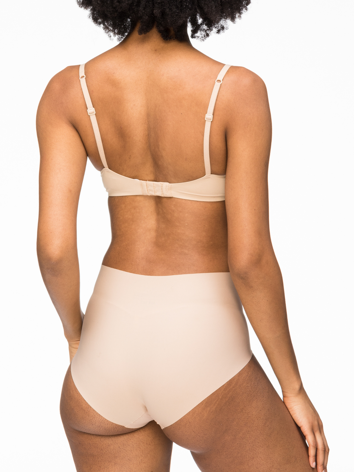 Back view of Nancy Ganz Body Light Waisted Brief featuring seamless bonded construction and laser cut edges for a smooth silhouette.