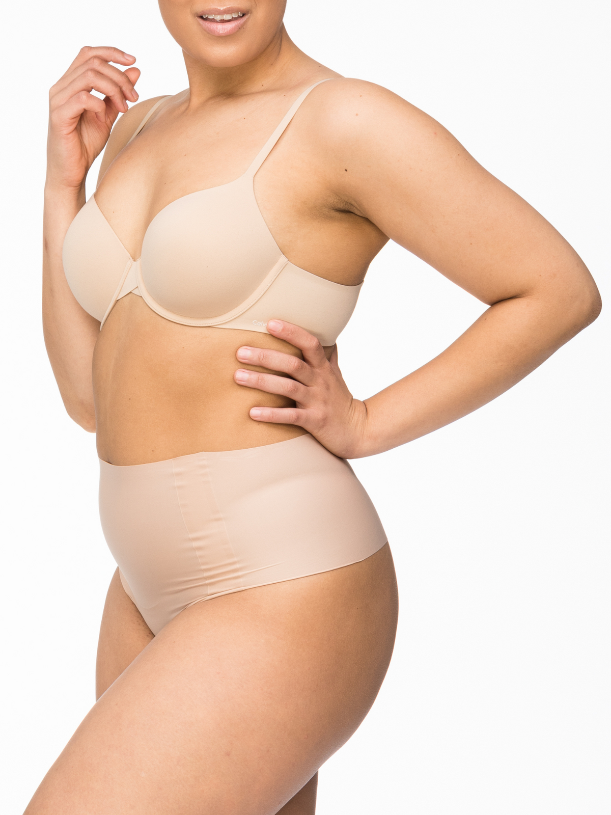 Side profile of Body Light Waisted Thong showing sleek laser cut edges and breathable fabric for all-day comfort.