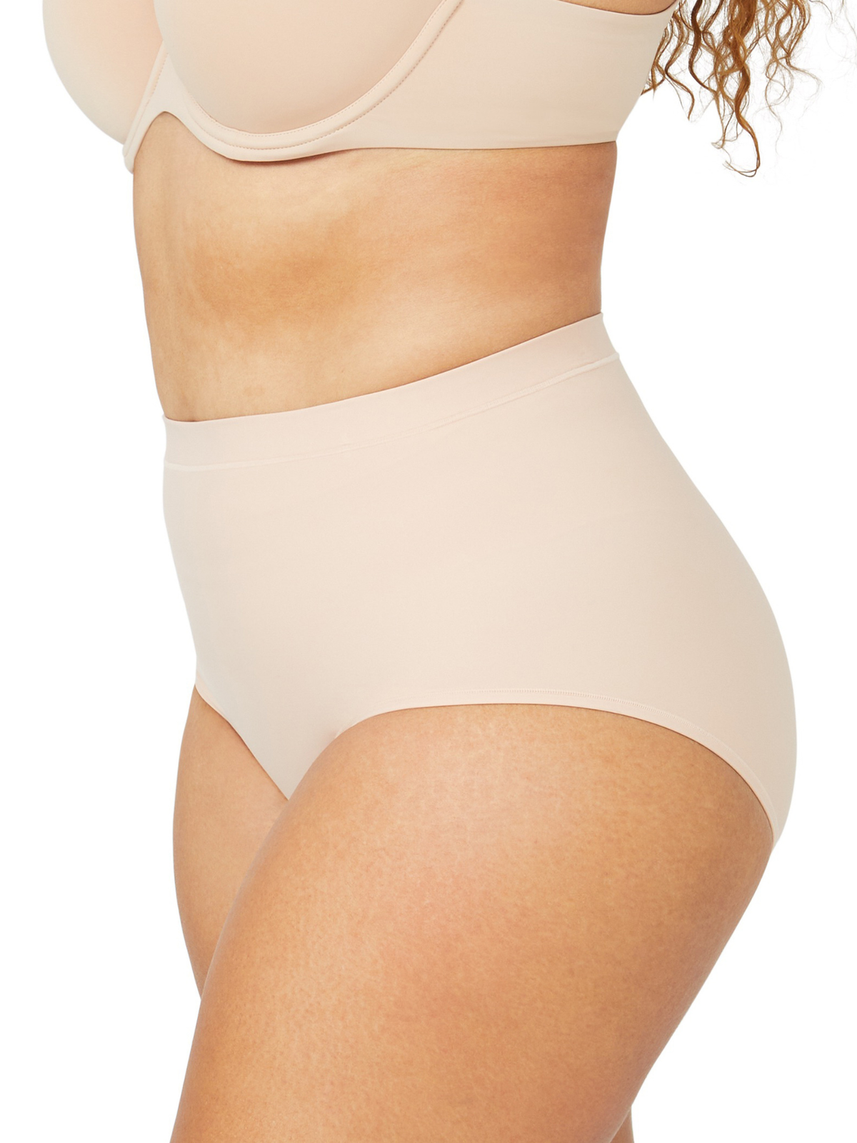 Side angle of Nancy Ganz Body Sculpt Waisted Brief, highlighting subtle shaping through the waist and hips.