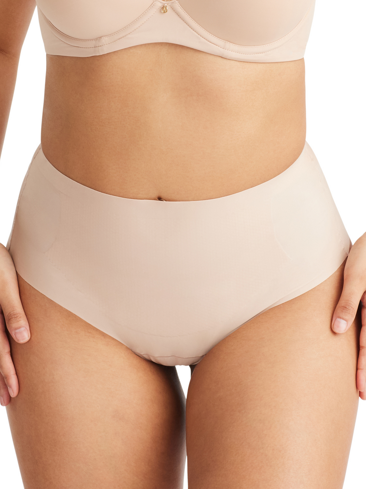 Front view of Nancy Ganz ‘No VPL’ waisted thong made from recycled nylon with moderate support and no visible panty lines.