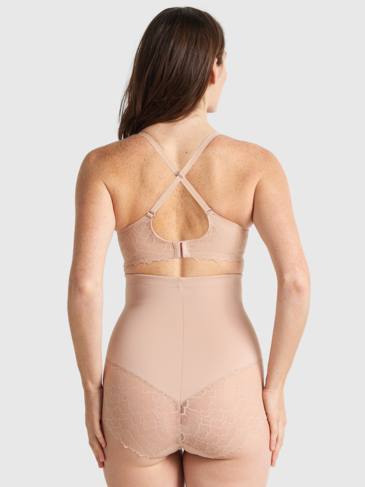 Nancy Ganz Sculpted Lace High-Waisted Brief in warm taupe, back view, showing seamless shaping and scalloped lace trim