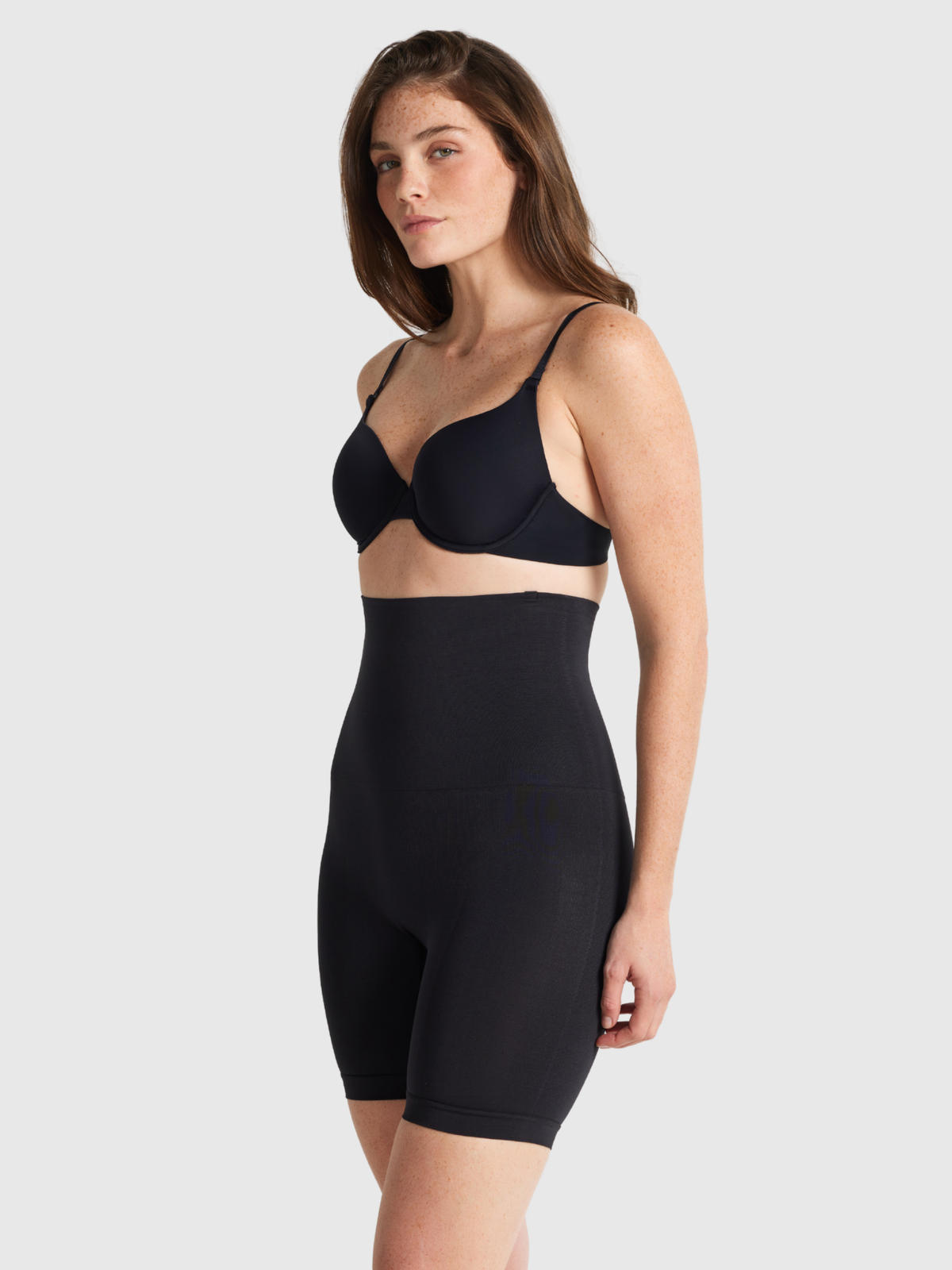 Side detail of high waist bike short highlighting snug underbust fit and breathable material for all-day wear.