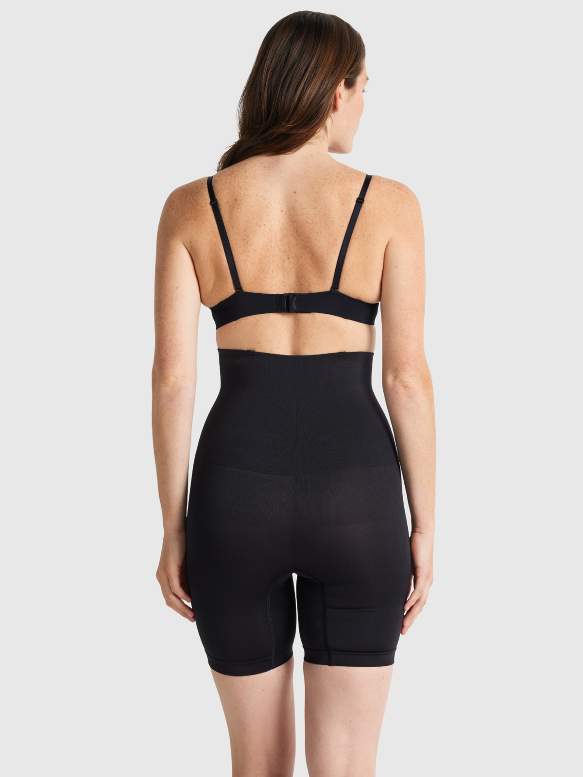Back profile of Seamless Seduction bike short with detachable straps, high-waisted design, and breathable fabric for comfortable, secure shaping.