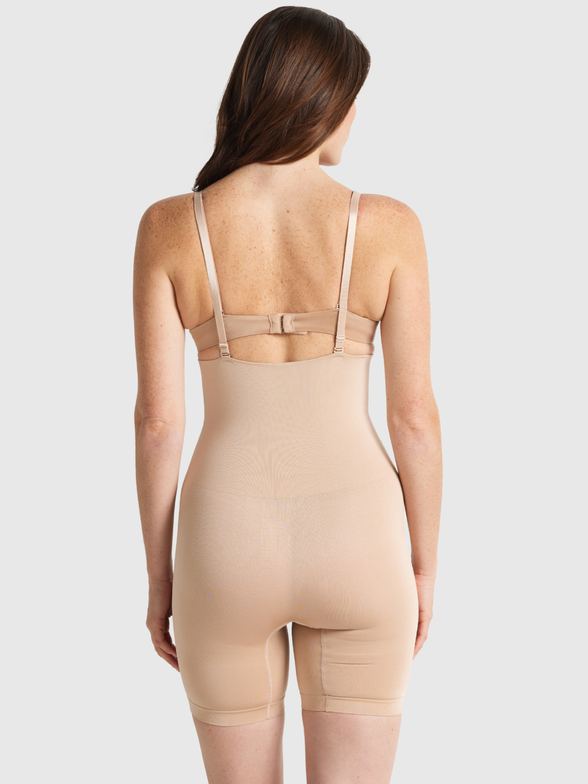 Nancy Ganz Seamless Seduction high waisted thigh shaper in Warm Taupe, back view showing support straps and seamless back