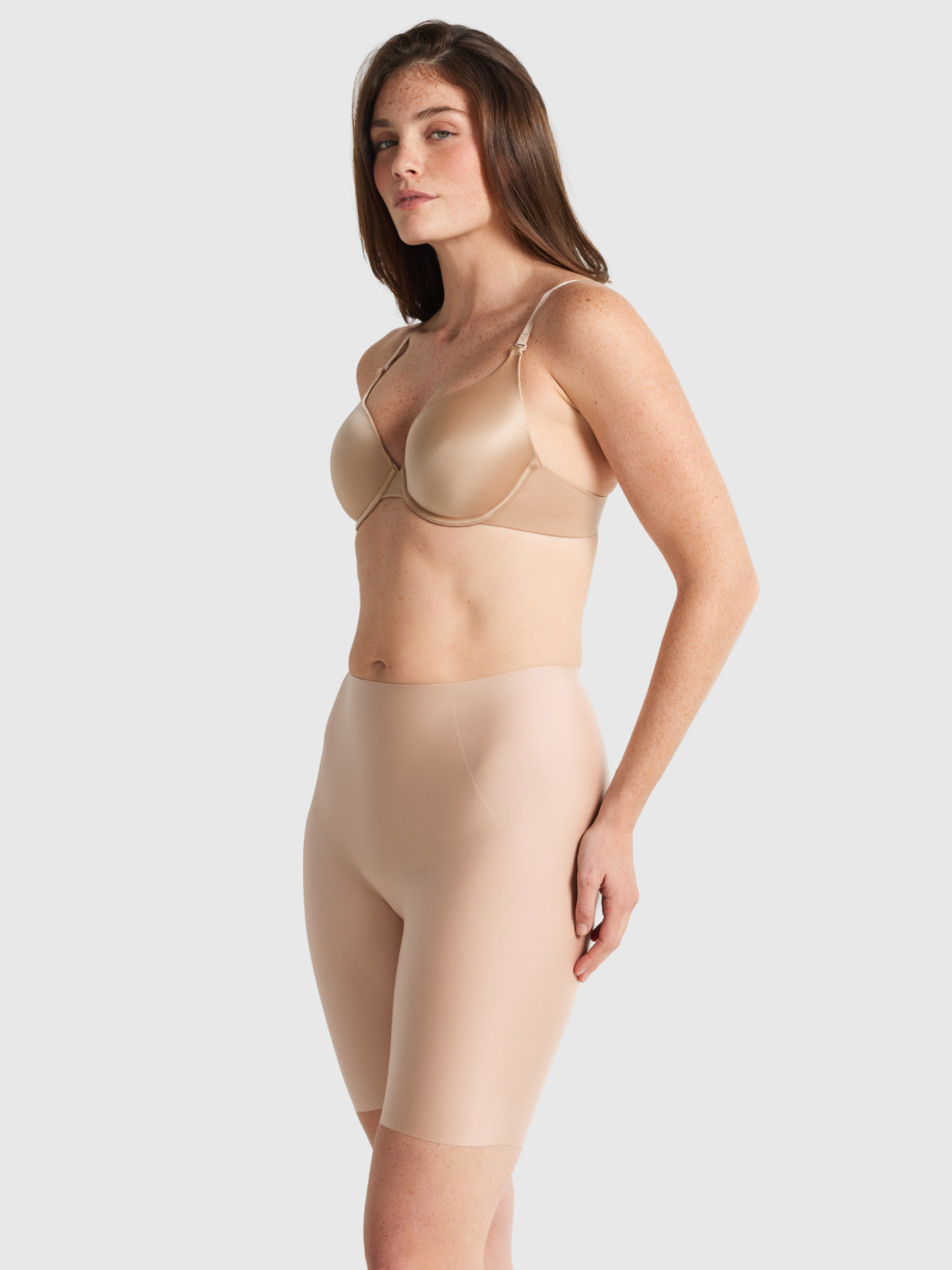 Side angle of Nancy Ganz No VPL thigh shaper highlighting performance stretch and recovery for smooth, invisible shaping under clothes.