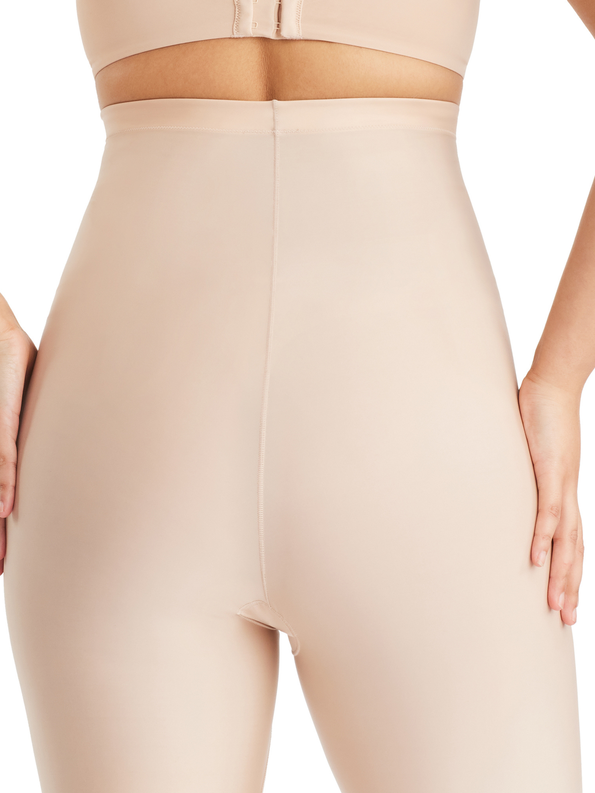 Back profile of NO VPL thigh shaper featuring seamless design, moderate support, and smooth finish under clothes.