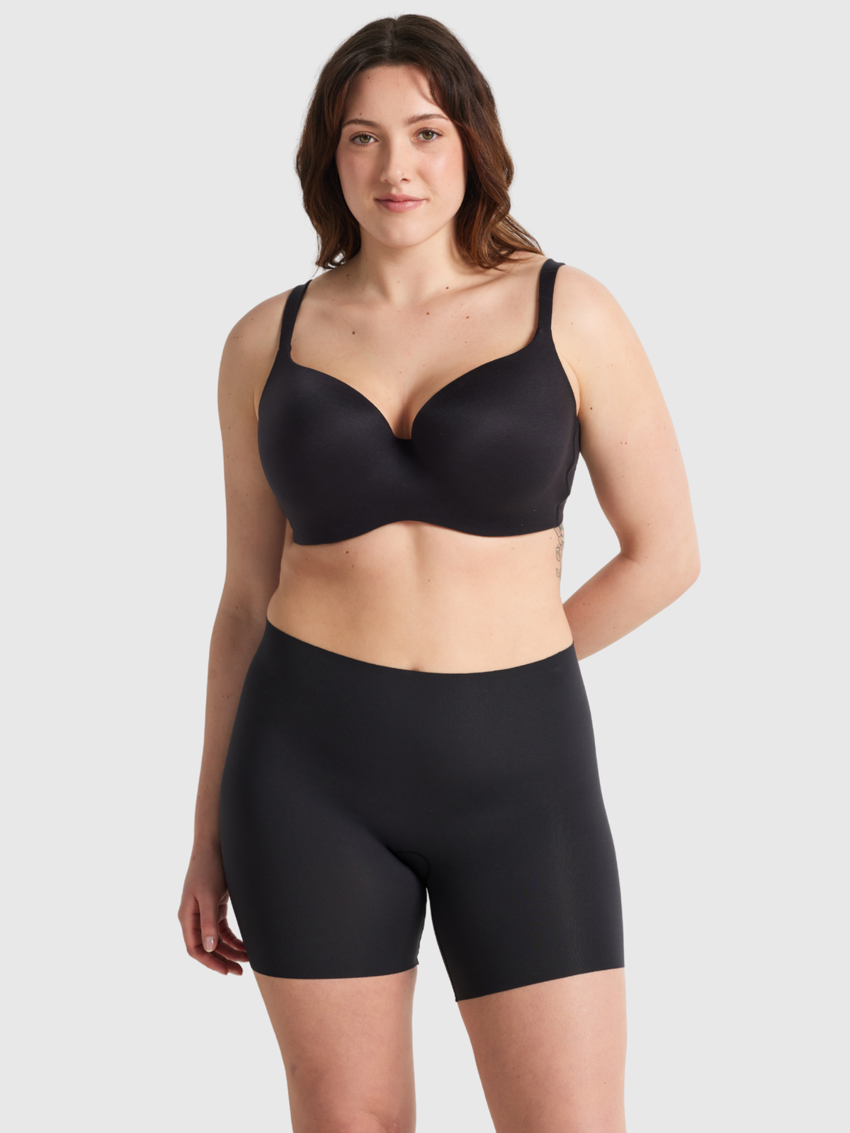 Body Smart W Short in Black by Nancy Ganz.