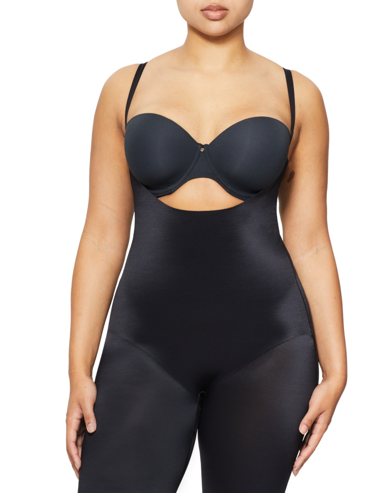 Front view of Nancy Ganz Body Skiins Underbust Jumpsuit in neutral, showing 360° body-hugging support with lightweight firm control.