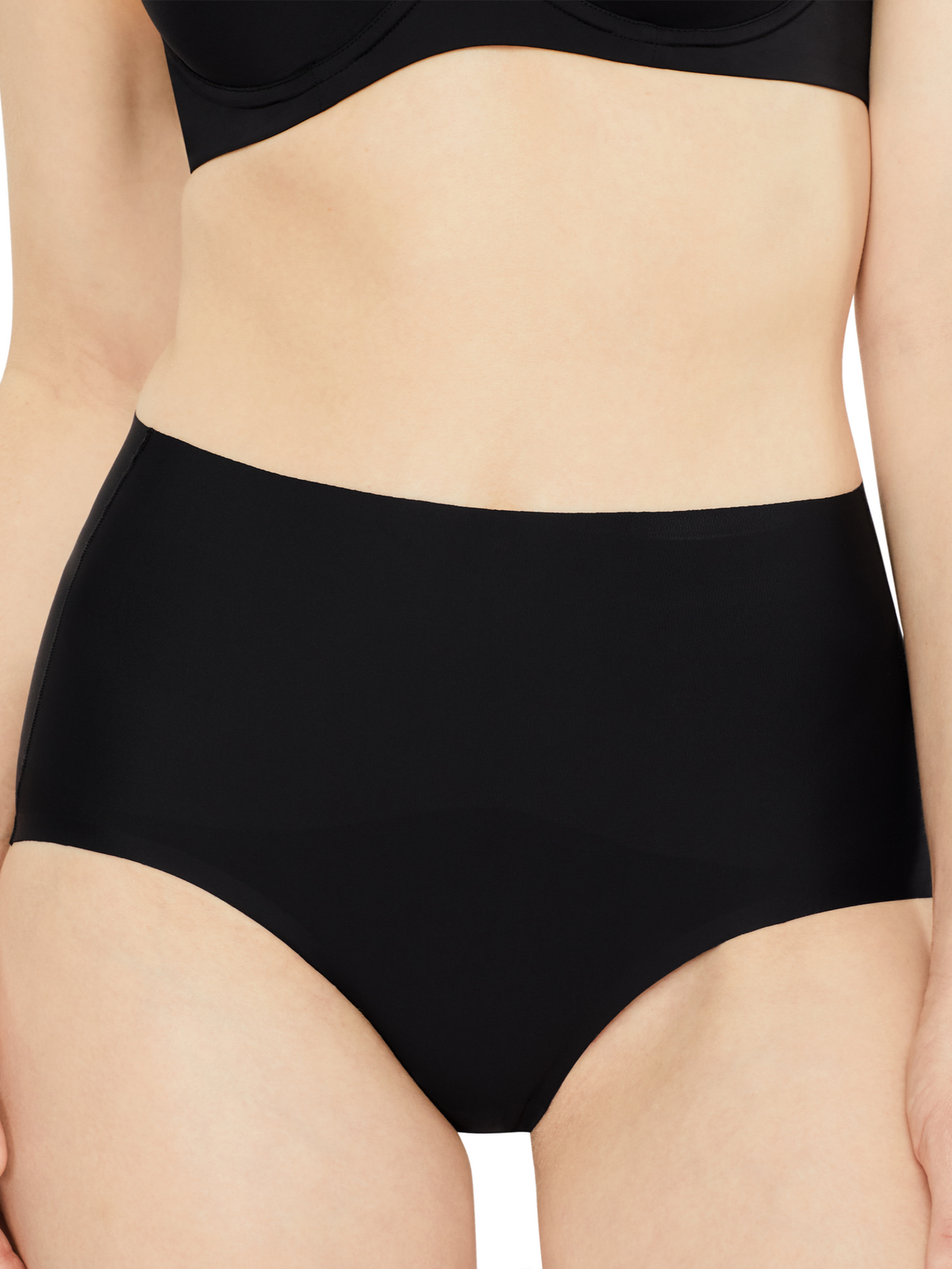 Front view of Nancy Ganz Revive Smooth Waisted Brief in Black, smooth black brief with flattering midsection support