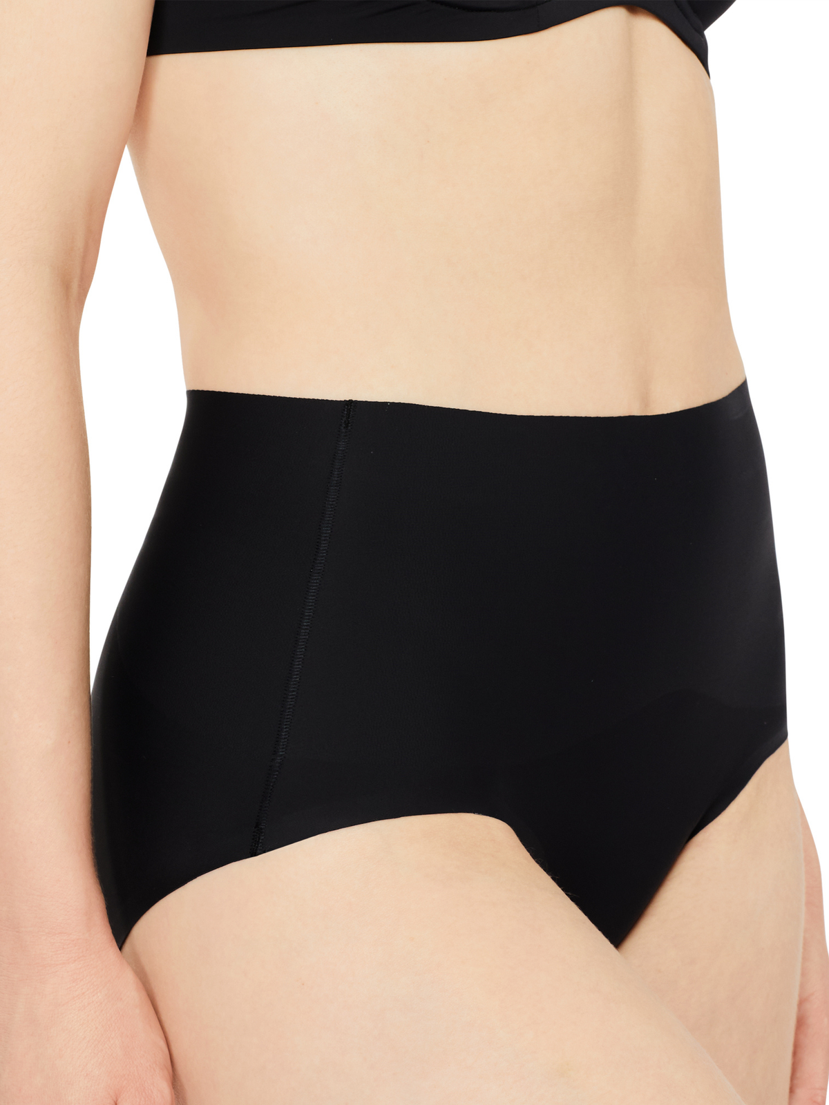 Side view of Nancy Ganz Revive Smooth Waisted Brief in Black, sleek black shaping brief that disappears beneath outfits