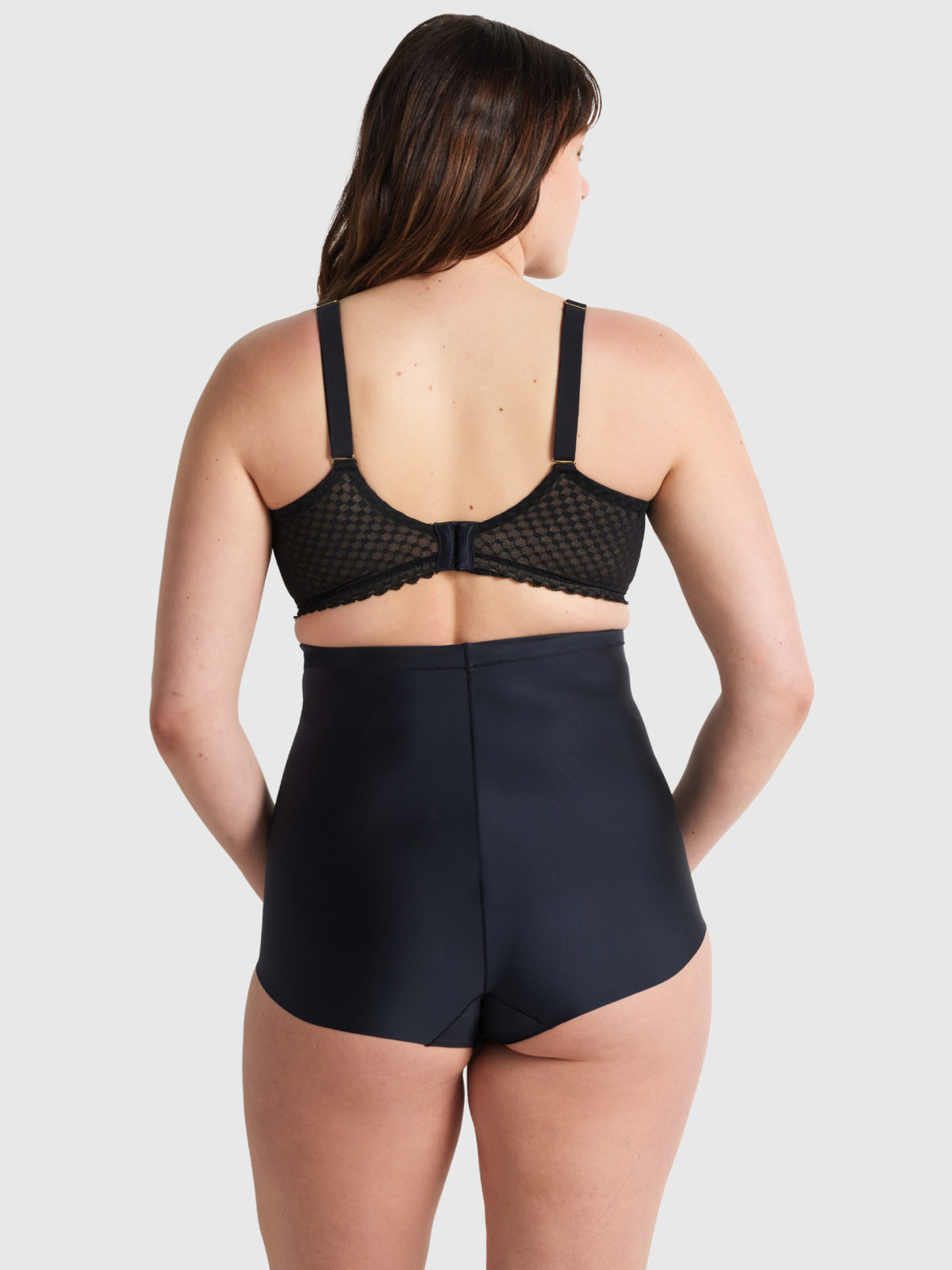 Back profile of Nancy Ganz No VPL High Waisted Brief showing smooth, silicone-free waistband and moderate support shaping.