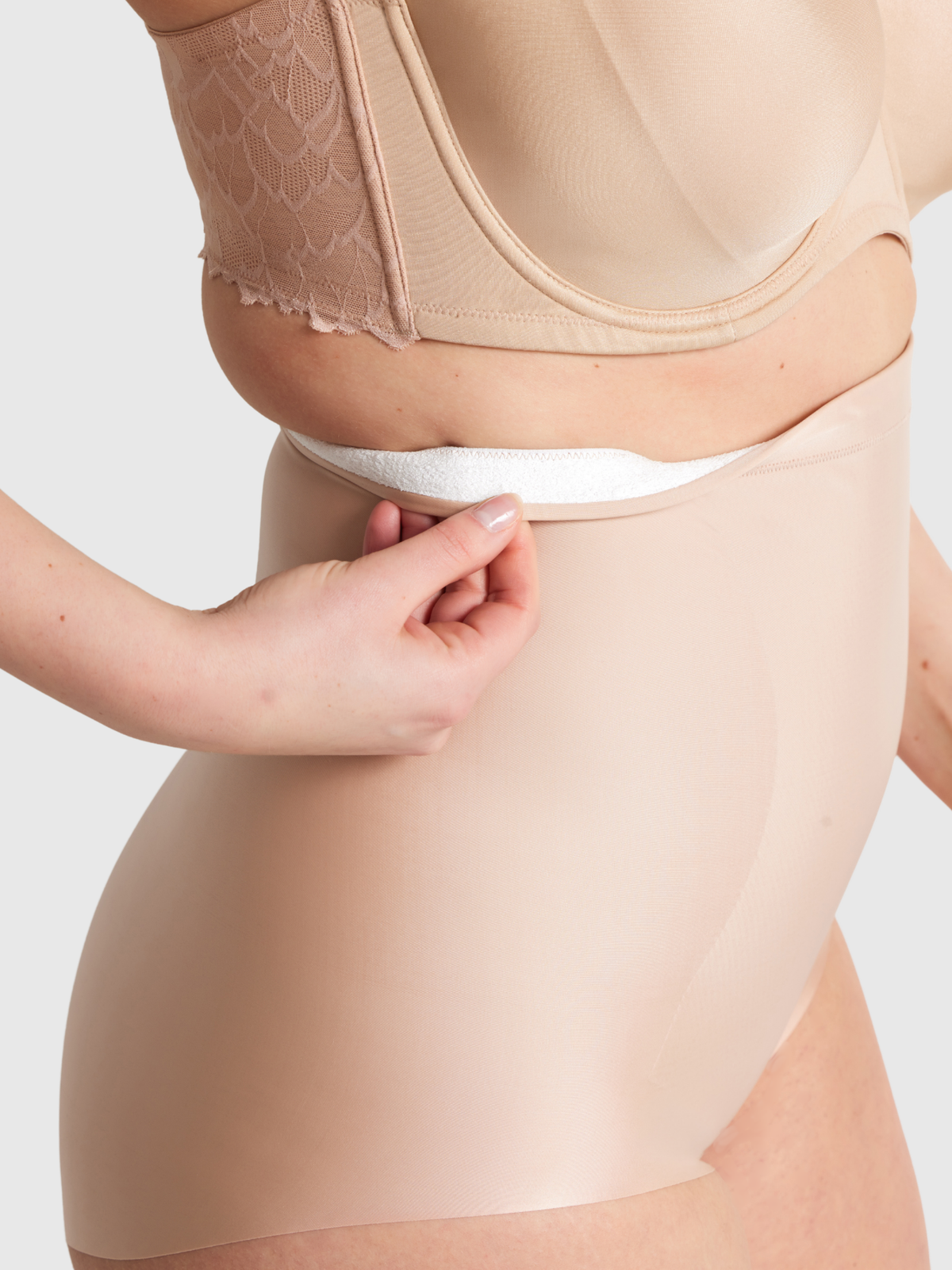 Close-up of No VPL High Waisted Brief fabric with innovative nano elastic and free cut edges for invisible shaping.