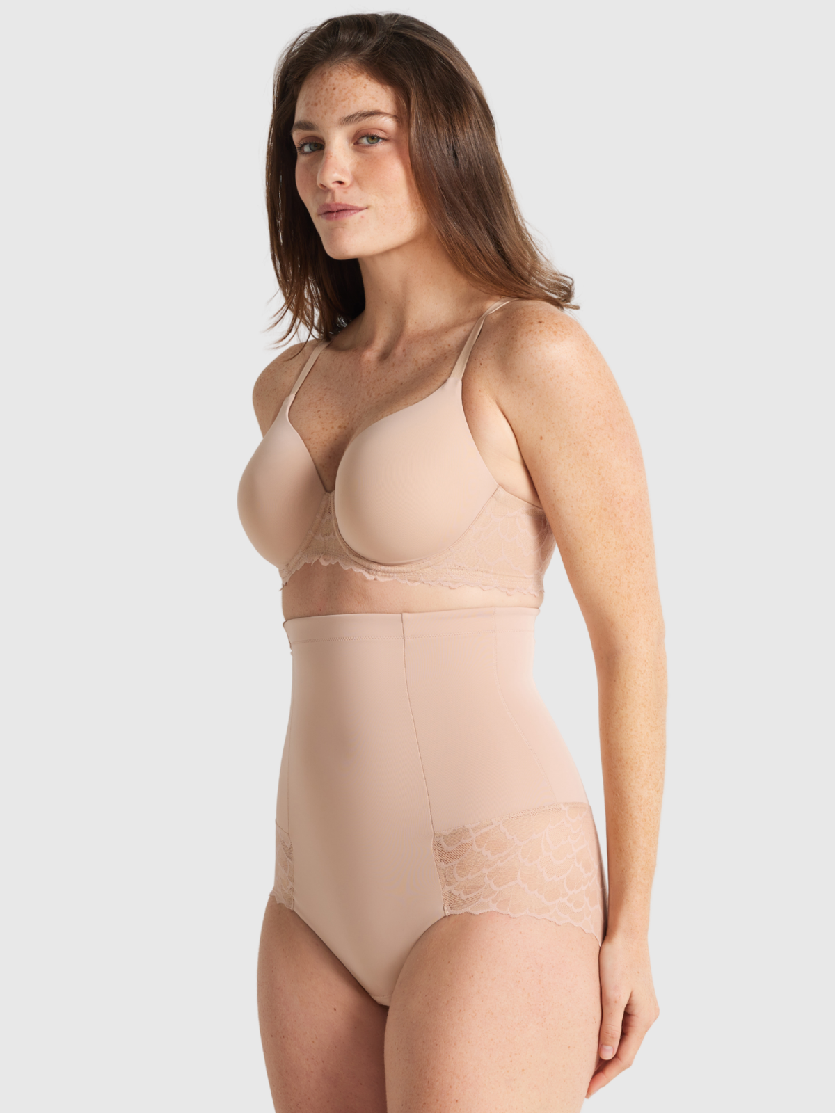 Nancy Ganz Sculpted Lace High-Waisted Brief in warm taupe, side view, showing smooth contouring and lace waistband detail