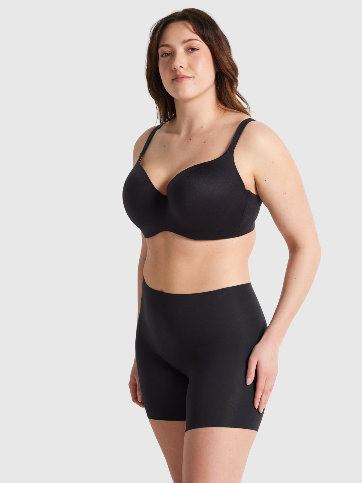 Side profile of Body Smart short featuring free-cut smoothing fabric for a sleek, no visible panty line finish.
