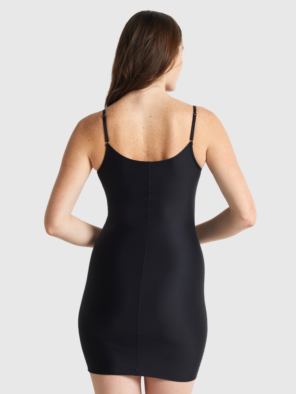 Nancy Ganz Slip Edit Slip in black, back view showing strap placement and smooth seamless finish across the back.